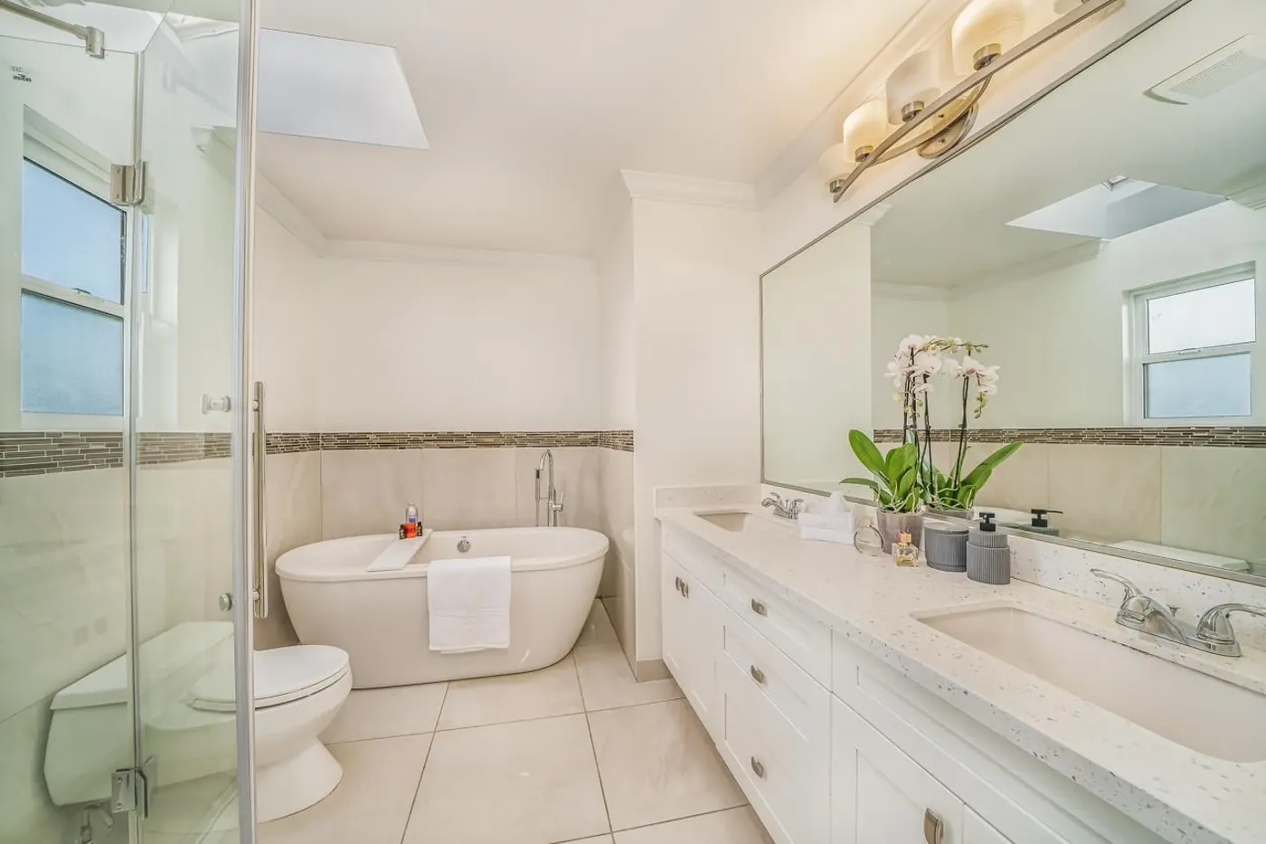 Primary bathroom with soaker tub at 3108 East 6th Ave