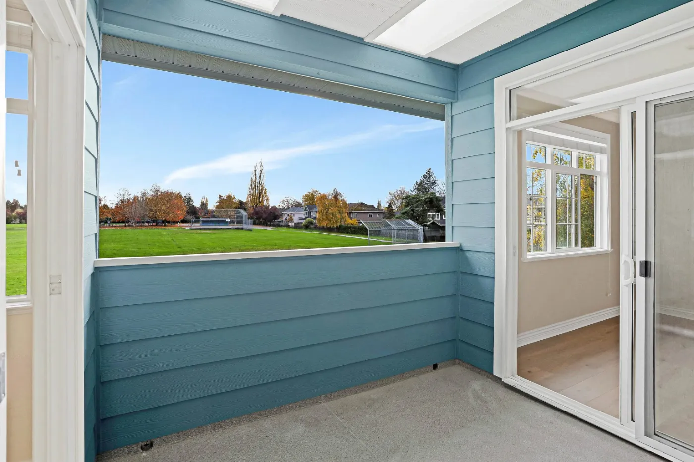 Covered balcony overlooking the park at 3660 Raymond Ave